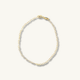 gold dainty bracelet featuring open heart links
