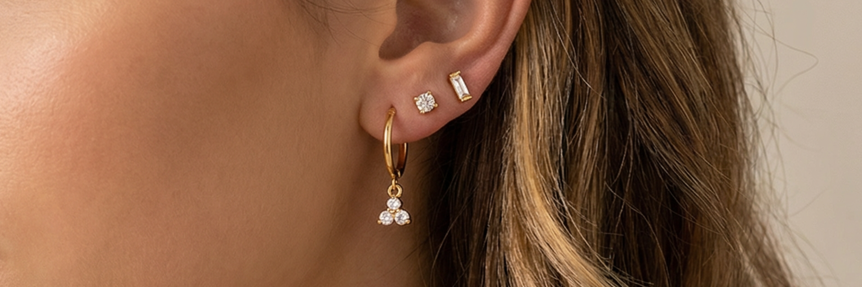 a women wearing dainty jewelry