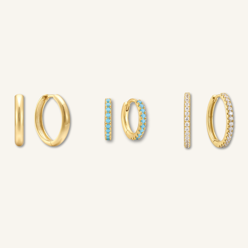 Exquisite gold hoop earrings, each adorned with dazzling gemstones, showcasing three distinct styles of opulence.