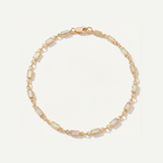 Gold opal bracelet with rectangular gemstones on a white background