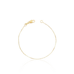 dainty gold bracelet featuring dainty box chain links