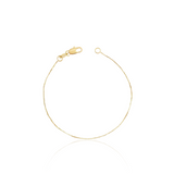 dainty gold bracelet featuring dainty box chain links