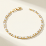 Gold tarnish free bracelet on a beige background