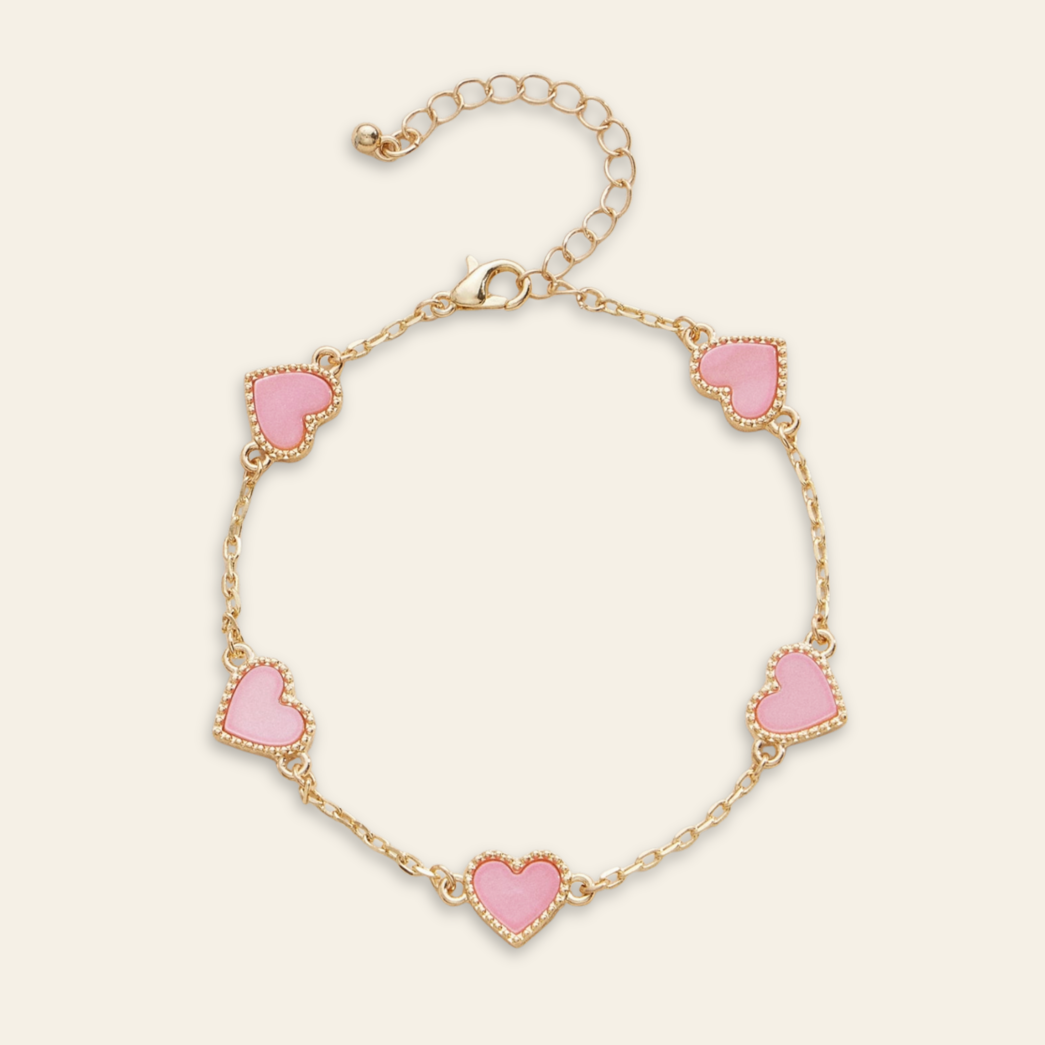 Bracelet with pink heart charms on a beige background