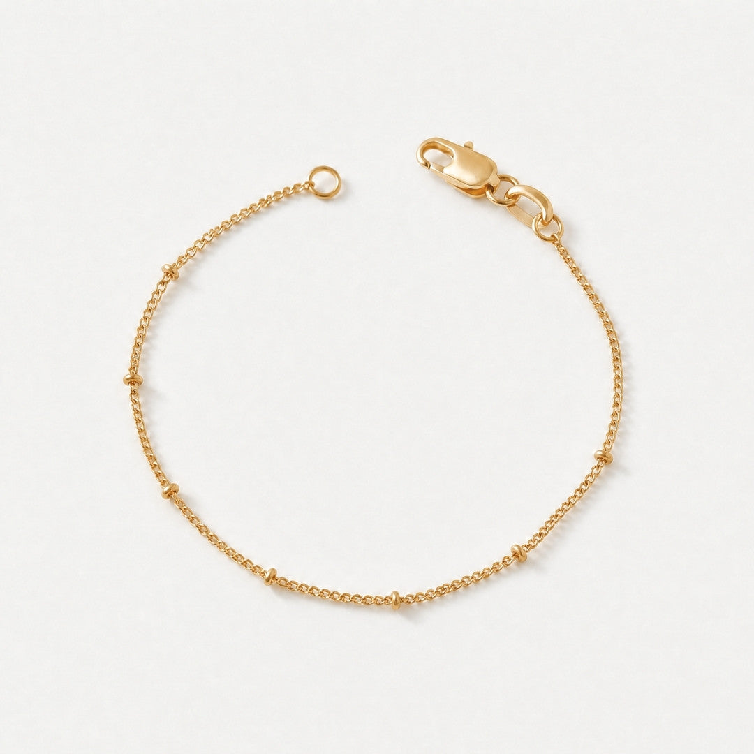 Gold filled satellite bracelet with delicate bead stations and lobster clasp, dainty tarnish-free jewelry by Kate Gates Jewelry