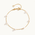 Ivy Gold Pearl Bracelet featuring freshwater pearl stations on a dainty gold chain by Kate Gates Jewelry