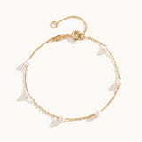Ivy Gold Pearl Bracelet featuring freshwater pearl stations on a dainty gold chain by Kate Gates Jewelry